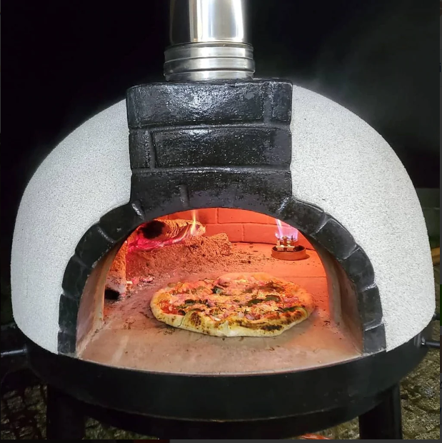 Pro Forno Wood-Fored Pizza Oven with Pizza and flame