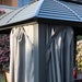 Kozyard Odyssey 10'x12' Hardtop Aluminum Permanent Gazebo with a Mosquito Net Sidewall and Privacy Wall Odyssey 10'x12' - KZOHG1012