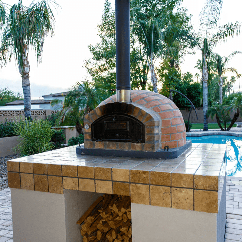 PizzaioliRusticPremiumWoodFiredPizzaOvenOutsidebythepool