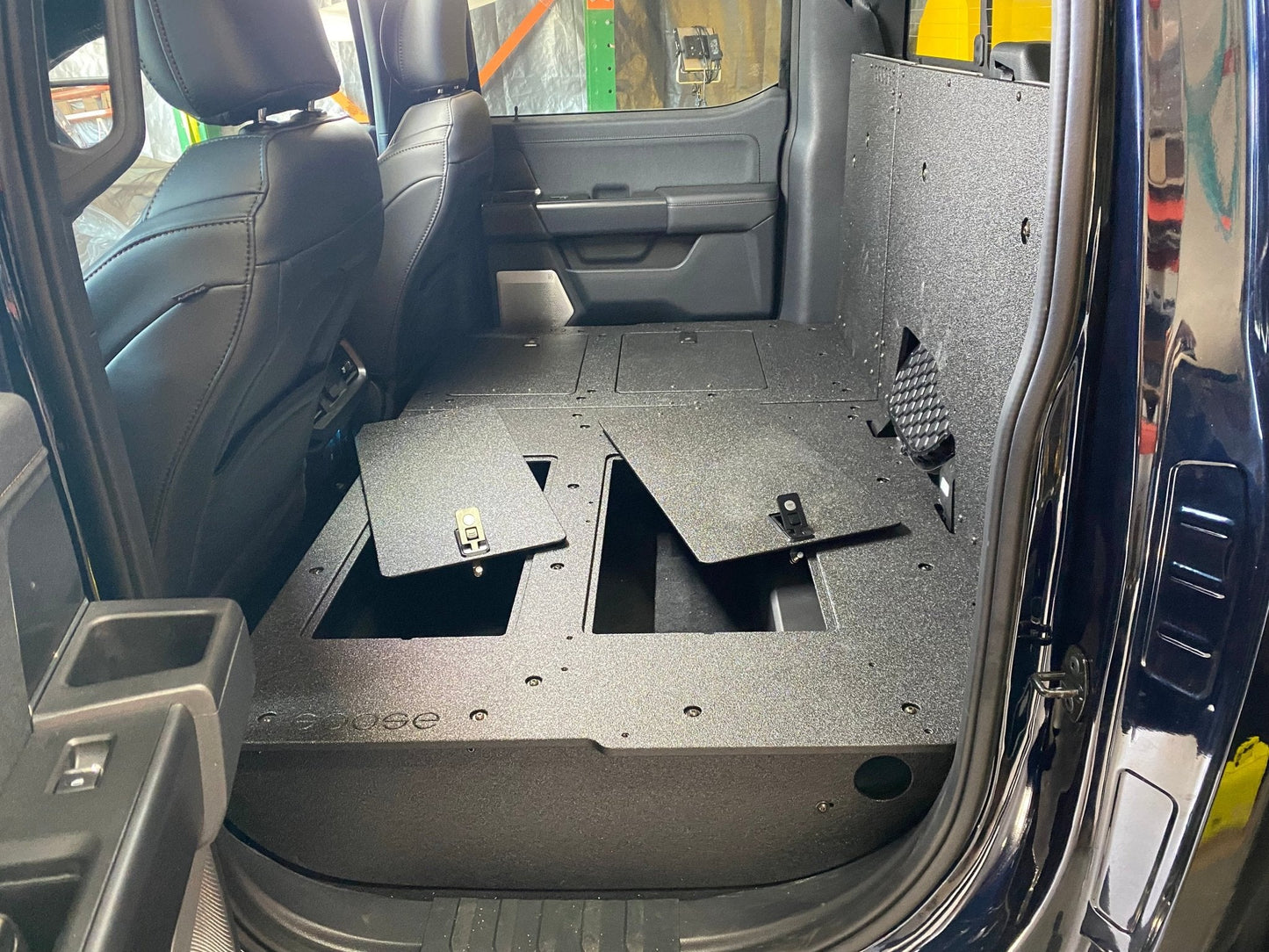 GOOSE GEAR Ford Super Duty Ford - F250-F350 - 2023-Present - 5th Gen. Crew Cab - Second Row Seat Delete Plate System with Factory B&O Subwoofer Center Wall with Exterior Port - 1210-GGR-SH