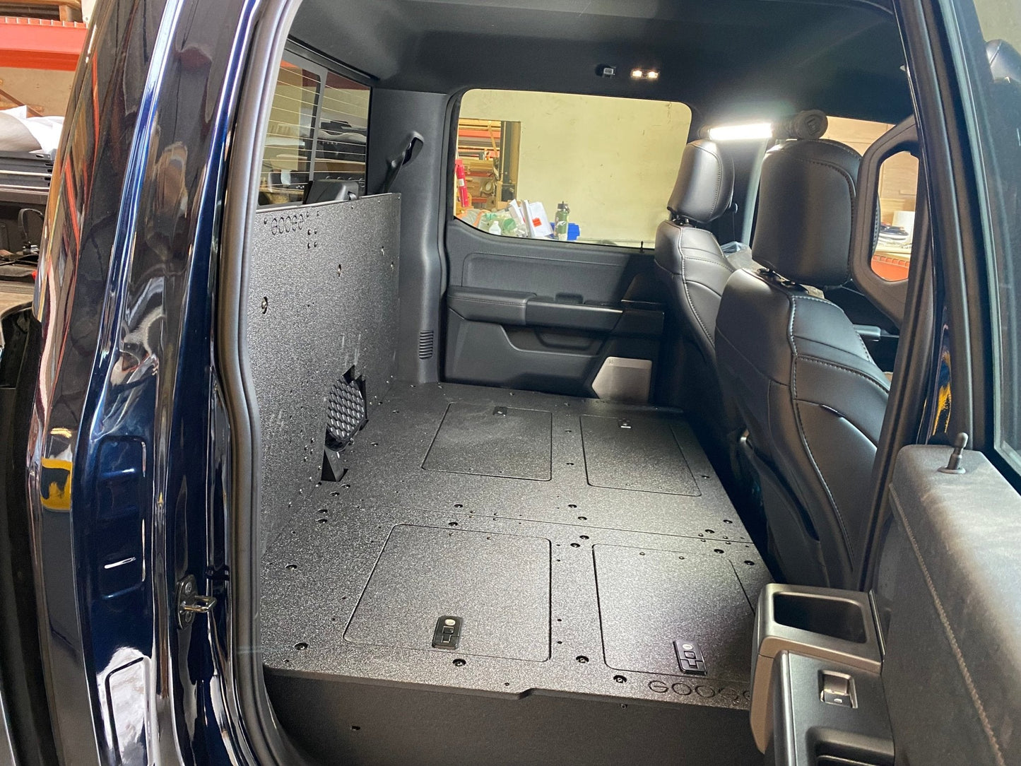 GOOSE GEAR Ford Super Duty Ford - F250-F350 - 2023-Present - 5th Gen. Crew Cab - Second Row Seat Delete Plate System with Factory B&O Subwoofer Center Wall with Exterior Port - 1210-GGR-SH