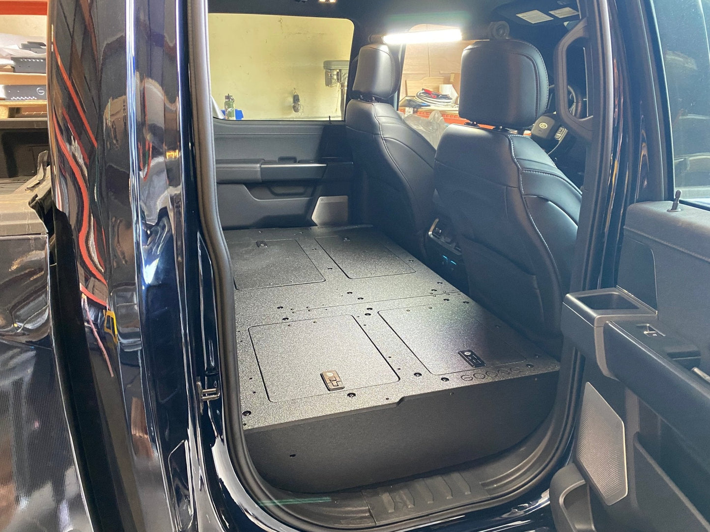 GOOSE GEAR Ford Super Duty Ford - F250-F350 - 2023-Present - 5th Gen. Crew Cab - Second Row Seat Delete Plate System with Factory B&O Subwoofer Center Wall with Exterior Port - 1210-GGR-SH