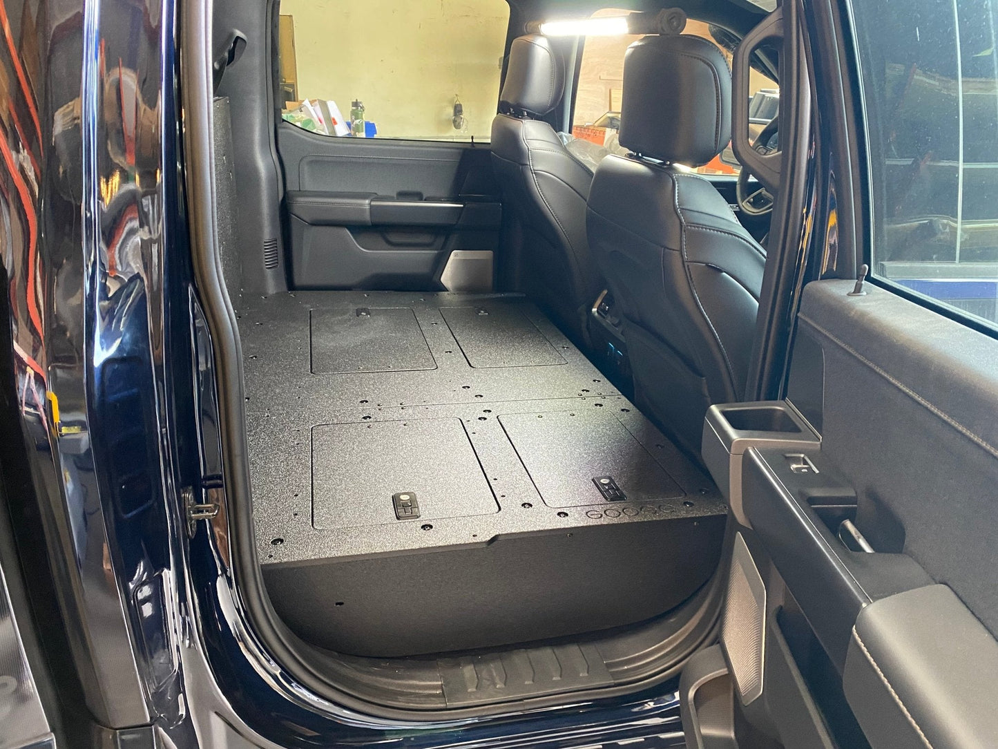 GOOSE GEAR Ford Super Duty Ford - F250-F350 - 2023-Present - 5th Gen. Crew Cab - Second Row Seat Delete Plate System with Factory B&O Subwoofer Center Wall with Exterior Port - 1210-GGR-SH