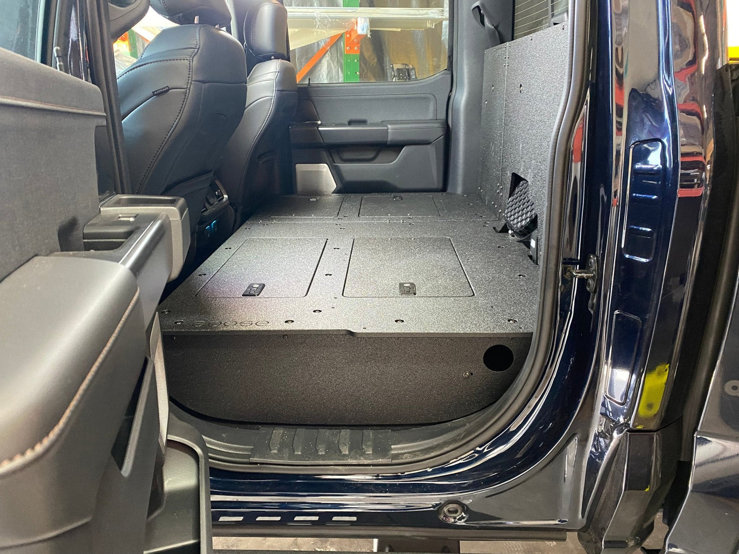 GOOSE GEAR Ford Super Duty Ford - F250-F350 - 2023-Present - 5th Gen. Crew Cab - Second Row Seat Delete Plate System with Factory B&O Subwoofer Center Wall with Exterior Port - 1210-GGR-SH