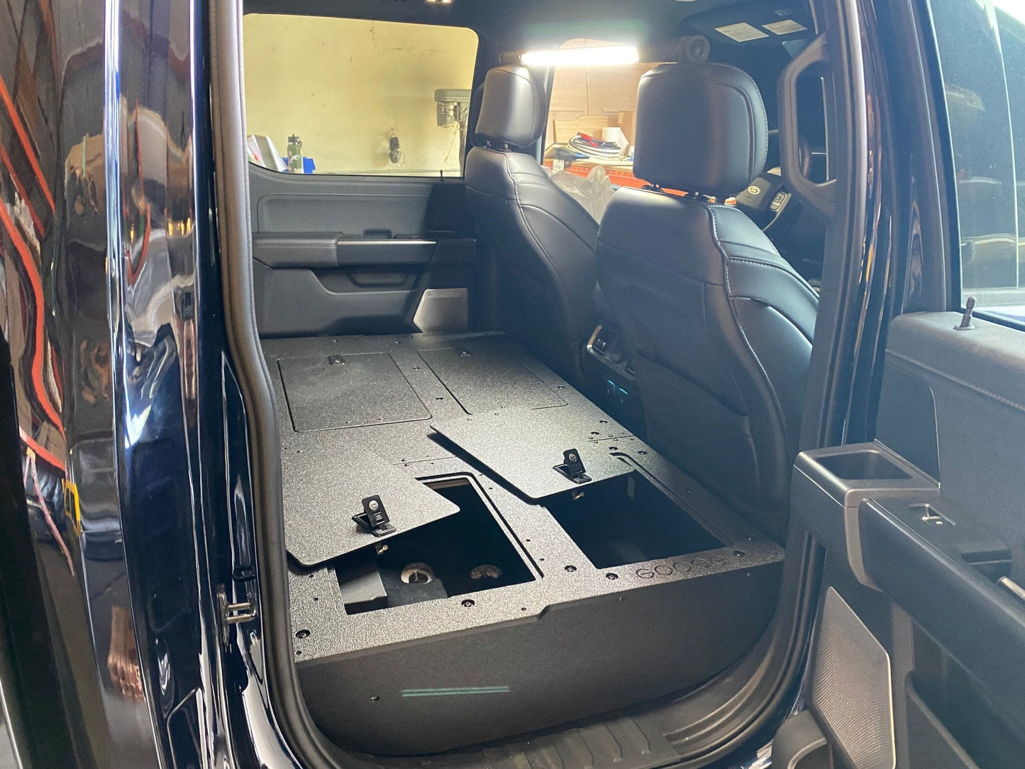 GOOSE GEAR Ford Super Duty Ford - F250-F350 - 2023-Present - 5th Gen. Crew Cab - Second Row Seat Delete Plate System with Factory B&O Subwoofer Center Wall with Exterior Port - 1210-GGR-SH