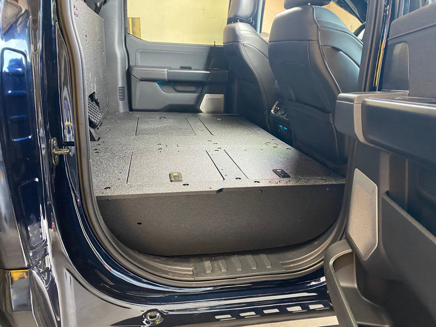 GOOSE GEAR Ford Super Duty Ford - F250-F350 - 2023-Present - 5th Gen. Crew Cab - Second Row Seat Delete Plate System with Factory B&O Subwoofer Center Wall with Exterior Port - 1210-GGR-SH