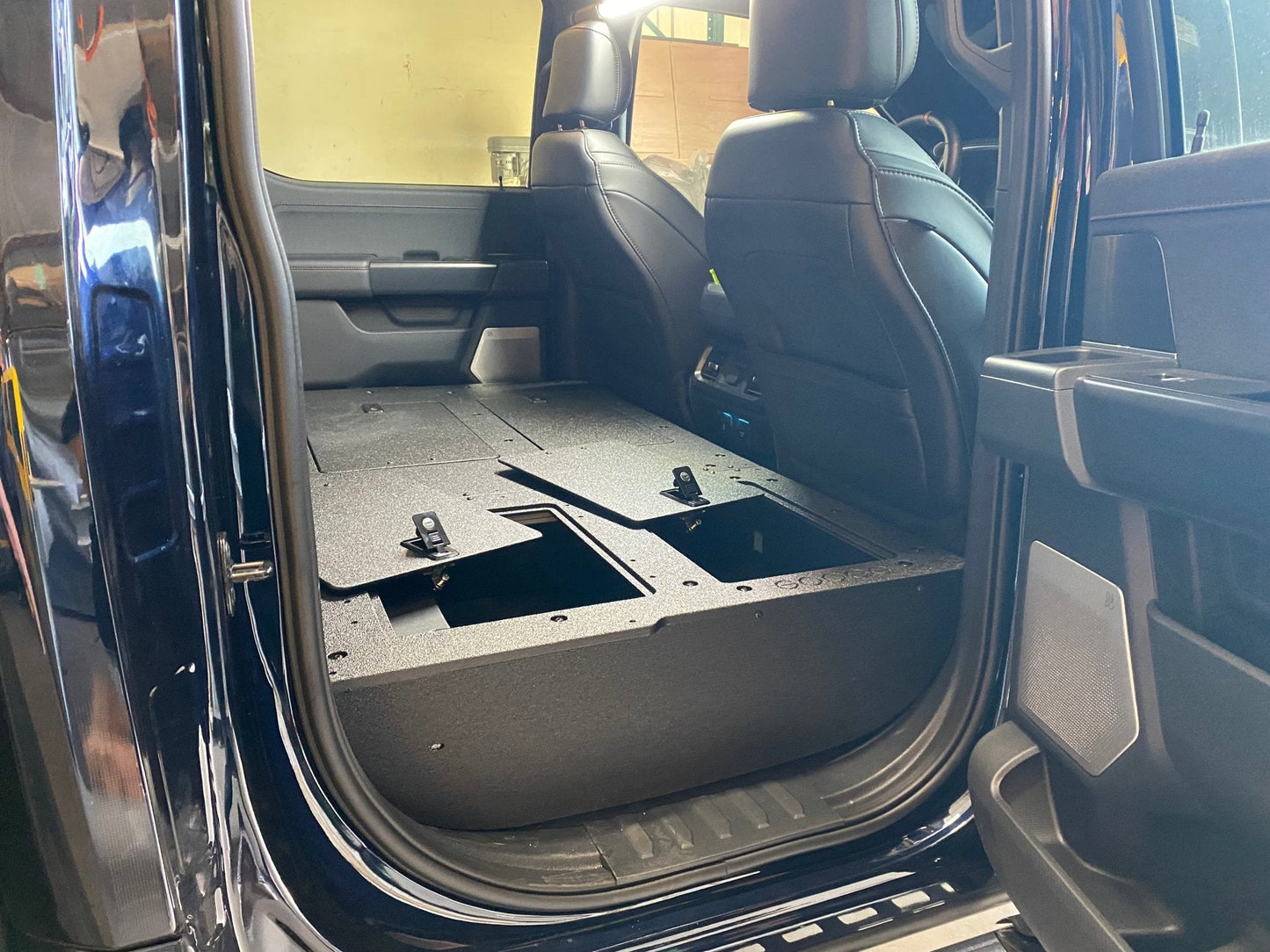 GOOSE GEAR Ford Super Duty Ford - F250-F350 - 2023-Present - 5th Gen. Crew Cab - Second Row Seat Delete Plate System with Factory B&O Subwoofer Center Wall with Exterior Port - 1210-GGR-SH