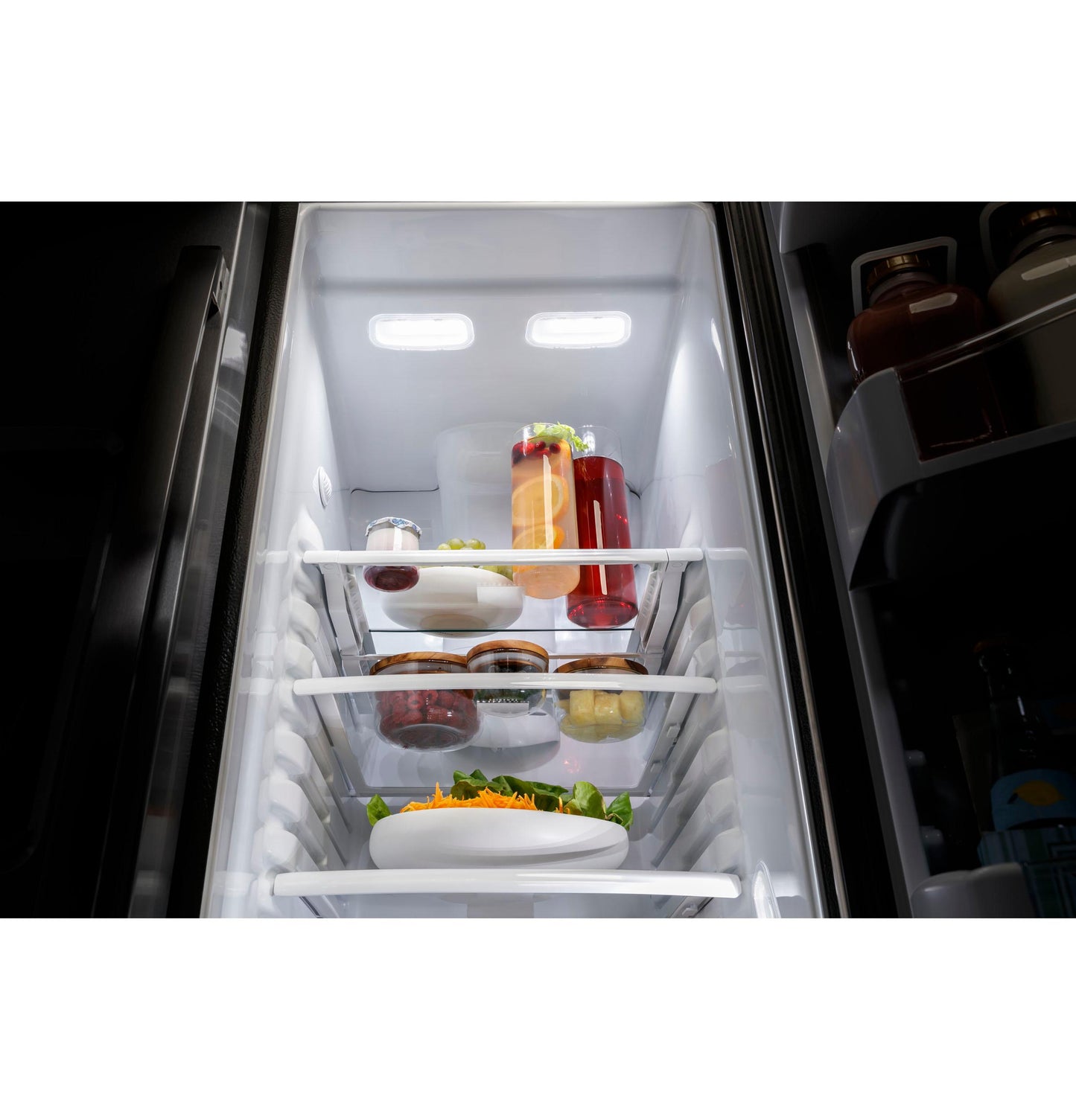 GE APPLIANCES 21.9 Cu. Ft. Counter-Depth Side-By-Side Refrigerator in Stainless Steel - PZS22MYKFS