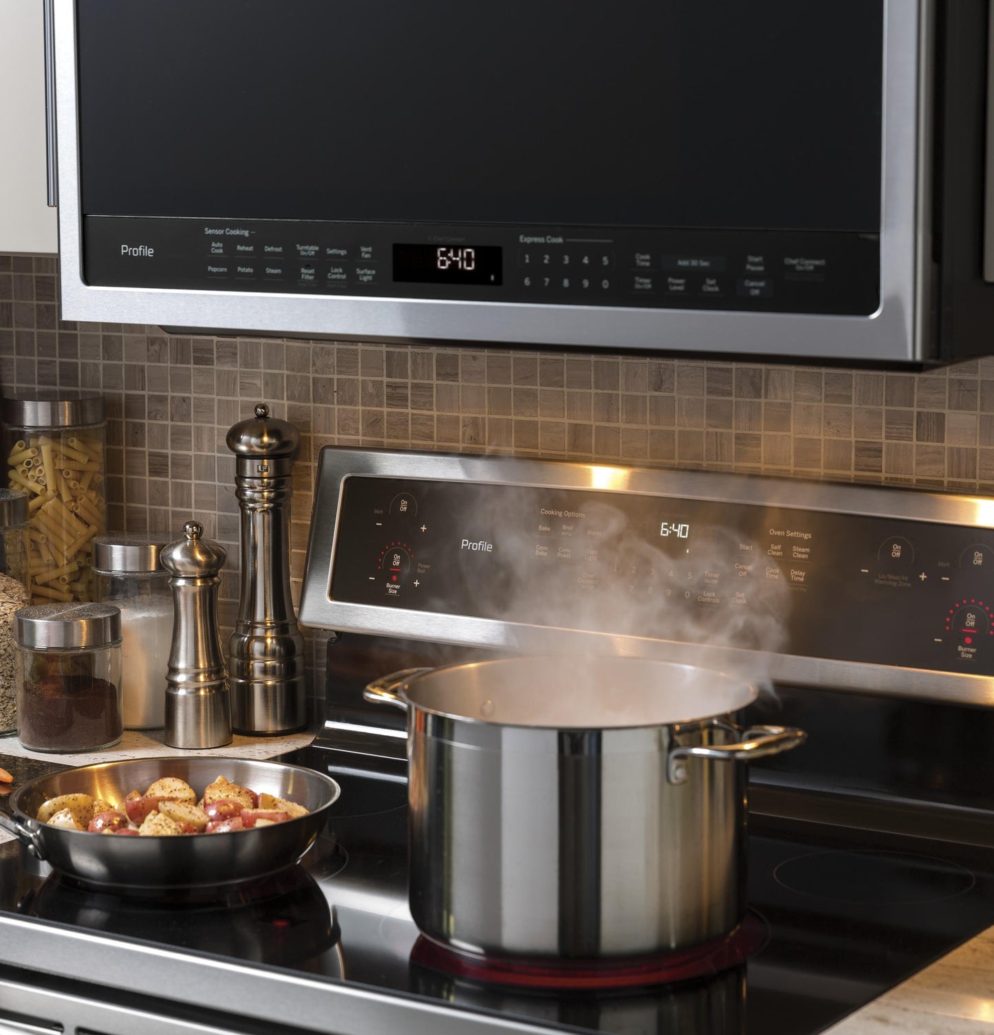 GE APPLIANCES Profile 2.1 Cu. Ft. Over-the-Range Sensor Microwave Oven in Stainless Steel - PVM9005SJSS