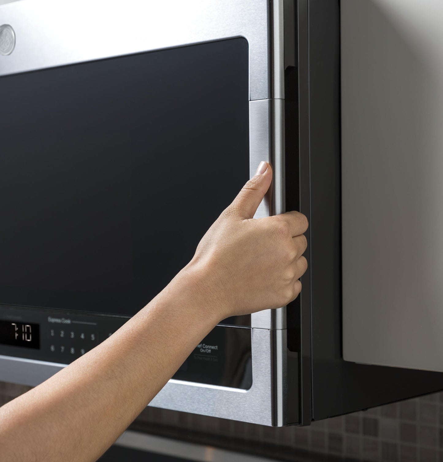 GE APPLIANCES Profile 2.1 Cu. Ft. Over-the-Range Sensor Microwave Oven in Stainless Steel - PVM9005SJSS