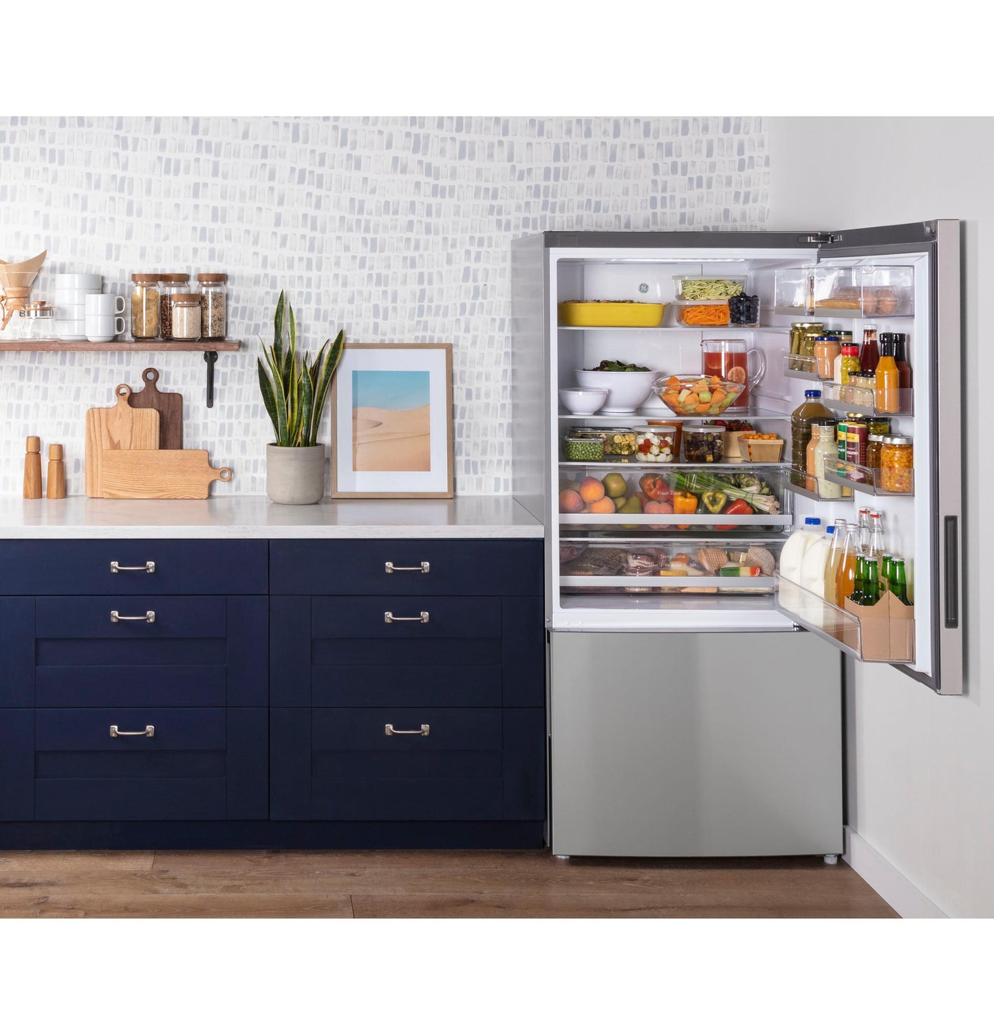 GE APPLIANCES GBE17HYRFS GE® ENERGY STAR® 17.7 Cu. Ft. Counter-Depth Bottom-Freezer Refrigerator in Stainless Steel - GBE17HYRFS