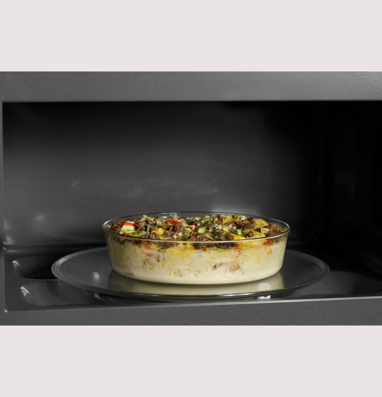GE APPLIANCES Profile 2.1 Cu. Ft. Over-the-Range Sensor Microwave Oven in Stainless Steel - PVM9215SKSS